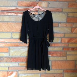 Black dress with lace detail on the back